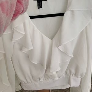 White blouse zipped up on the side  🤍